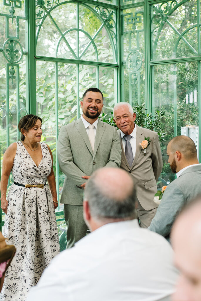 A ceremony taking place at the Mosaic Solarium in the Denver Botanic Gardens