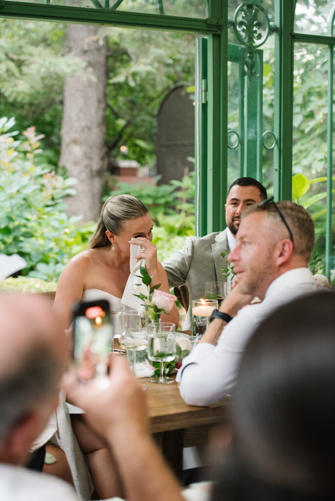 candid reception moments at the Denver Botanic Gardens Wedding inside the Mosaic Solarium